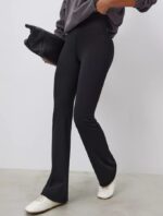NEVERLATE Спортивные брюки клеш с утягивающим поясом черные NW01.1340.1